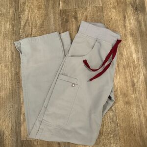 Woman’s light gray scrub bottoms